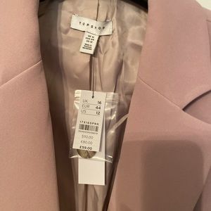 New with tags pink single button blazer. Good for fall, spring and summer.